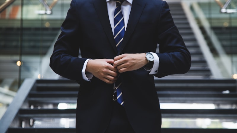 Professional standing at a crossroads, symbolising a career change